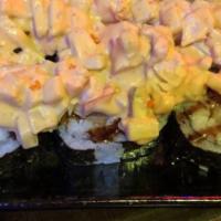 Summer Dream Roll · Inside shrimp tempura, crab meat, topped with shrimp, cucumber and mayo sauce and eel sauce.