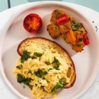 Spinach & Feta Omelette  · Three eggs, onion, tomato, and feta cheese cooked as an omelette served with hash brown, toa...