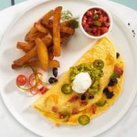 Chili Omelette · Three eggs topped with our famous chili and onion cooked as an omelette served with hash bro...