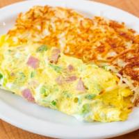 Ham Omelette · Three eggs, onion, and green peppers cooked as an omelette served with hash brown, toast, an...