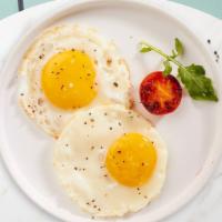 Eggs Platter · Two eggs cooked in your choice of style and served with toast and jelly on the side.