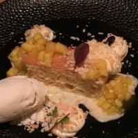 Tres Leches · vanilla cake soaked in our tres leches syrup, pineapple, toasted coconut