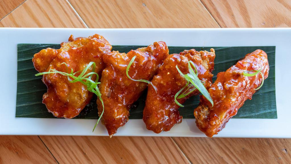 Wings (4) · Spicy. Fried marinated chicken wings coated with enough honey sweet chili sauce to make your taste buds melt