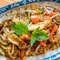 Drunken Noodle · Spicy, Vegetarian, Gluten-free.Stir-fried broad flat rice noodles, onions, tomatoes, bell pe...