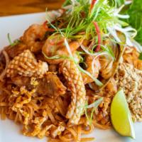 Pad Thai · Vegetarian, Gluten-free. Traditional Thai dish of stir-fried thin rice noodles, Chinese chiv...