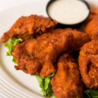 Buffalo Chicken Wings · Chicken wings dipped in our spicy buffalo sauce.