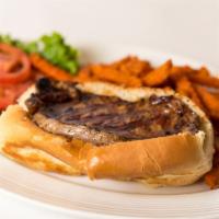 Steak Sandwich · Gregg's famous rib eye steak sandwich grilled to perfection. Served on a grilled torpedo rol...