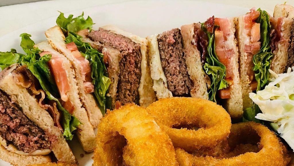 Cheeseburger Club · Your choice of American, Mozzarella or Swiss cheese. All clubs have lettuce, tomato, mayo and bacon. Served with French fries and cole slaw.
