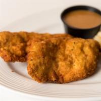 Boneless Chicken Cutlet · Breaded chicken breast served with brown gravy and your choice of two side dishes.