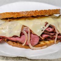 #16 - Sun Burn · Hot Top Round  Pastrami, Melted Mild Swiss, Fried Onion, Spicy Mustard, on a Rye Toast.