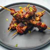 Jerk Chicken Skewers · Our succulent chicken skewers are slow smoked and grilled with a combination of white and da...
