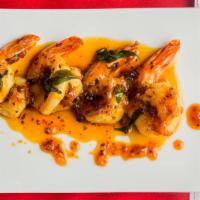 Honey Garlic Shrimp · SHRIMP COOKED IN GARLIC, ONION, HONEY, MUSTARD SEEDS AND CURRY LEAVES WITH TANGY SAUCE.
