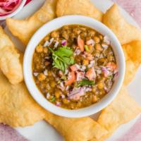 Chole Bhature (2 Pc) · Bhatoora is a fluffy deep-fried leavened bread made of all purpose flour. served with chole ...