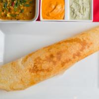 Masala Dosa · The masala dosa(RICE PANCAKE) is made by stuffing a dosa with a lightly cooked filling of po...