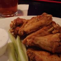 Chicken Wings · Gluten-free. Served with celery sticks, bleu cheese or ranch. Available in Buffalo, Spicy Bu...