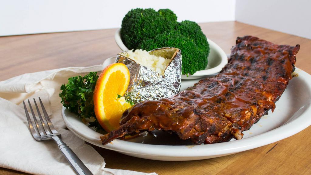 Barbecue Baby Back Ribs Dinner Rack · Winner best ribs! Lean and tender, slowly cooked until they fall off the bone. Grilled over open flames and basted with our smokey BBQ sauce.