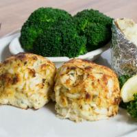 Maryland Crab Cakes Double · Lump crabmeat, blended and seasoned Maryland style, broiled.