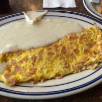 The Meat & Cheese Omelette · Choose one (bacon, ham, pork sausage, beef sausage or pork roll) choose one (American, swiss...