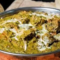 Lamb Saag · Boneless lambs cooked with spinach in a ginger, garlic, herbs and mild spices.