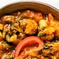 Kundapur Vegetables · Vegetarian. Medium spicy. Mixed veg cooked with coconut milk and dry red chillies. Tempered ...