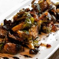 Brussel Sprouts · roasted with bacon, shallots, truffle oil, balsamic reduction sauce