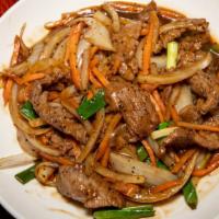 Mongolian Beef · Hot and spicy. Sliced beef cooked with onions, carrots and scallions in spicy brown sauce.