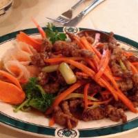 Hot Crispy Beef · Spicy. Crispy shredded beef sautéed with carrots and celery in a hot pepper sauce.