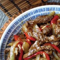 Beef With Black Pepper Sauce · Spicy level one. Red&Green pepper, onion.