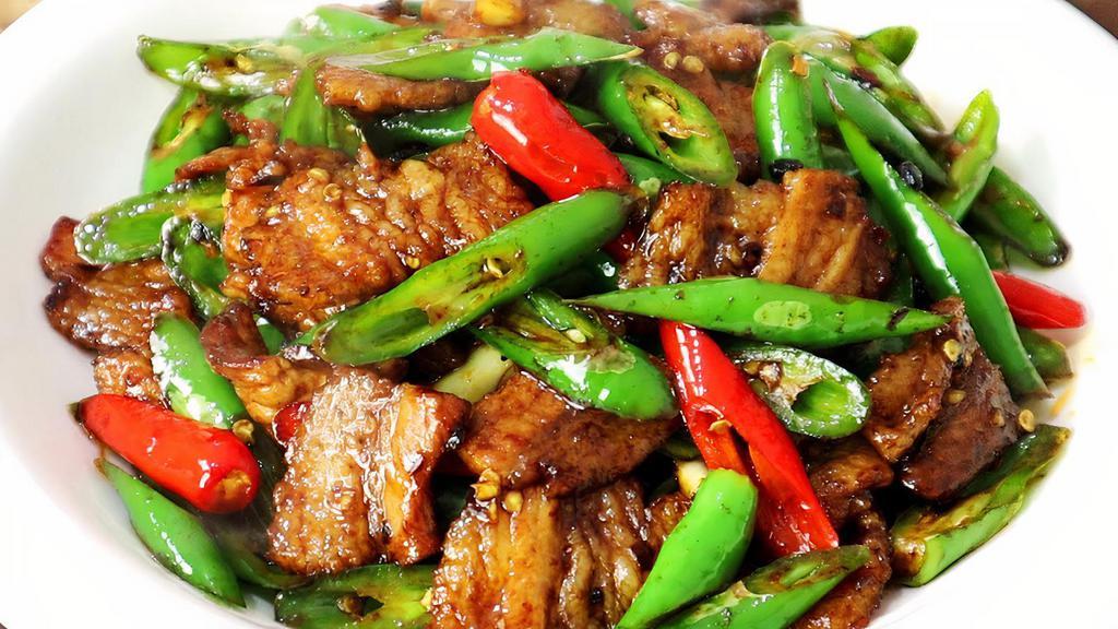Pork Belly With Green Pepper · Spicy level three.