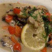 Veal Piccata (With Side Of Penne) · Scallopini of veal, sautéed with mushrooms, red pepper and capers in light lemon sauce.