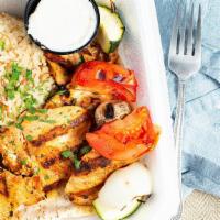 Chicken Kabob · Grilled pieces of chicken with lettuce, tomatoes, pickles and garlic sauce.