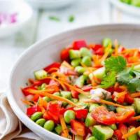 Chicken Asian Edamame Salad · Edamame, cabbage, cucumbers, red bell peppers, shredded carrots, green onions.