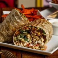 Chicken Shawarma Wrap · Seasoned chicken, lettuce, tomato, pickles, & garlic sauce wrapped in flour tortilla