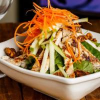 Grilled Chicken Salad · Mixed greens, carrots, granny smith apples, feta cheese, and candied walnuts tossed in a bal...