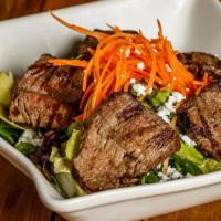 Beef Tenderloin Salad · Mixed greens, carrots, sun-dried tomatoes, artichoke, red onion, roasted corn toasted, black...