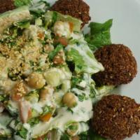 Falafel Salad · Romaine, cucumber, tomato, parsley, green and red onions, fresh mint, and chickpeas tossed i...