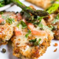 Lemon Butter Chicken · Lightly breaded chicken breast, topped with lemon butter sauce, capers, tomatoes, and basil,...