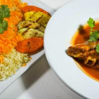 Lamb Shank · One lamb shank stewed in a Mediterranean broth, served with saffron basmati rice and grilled...