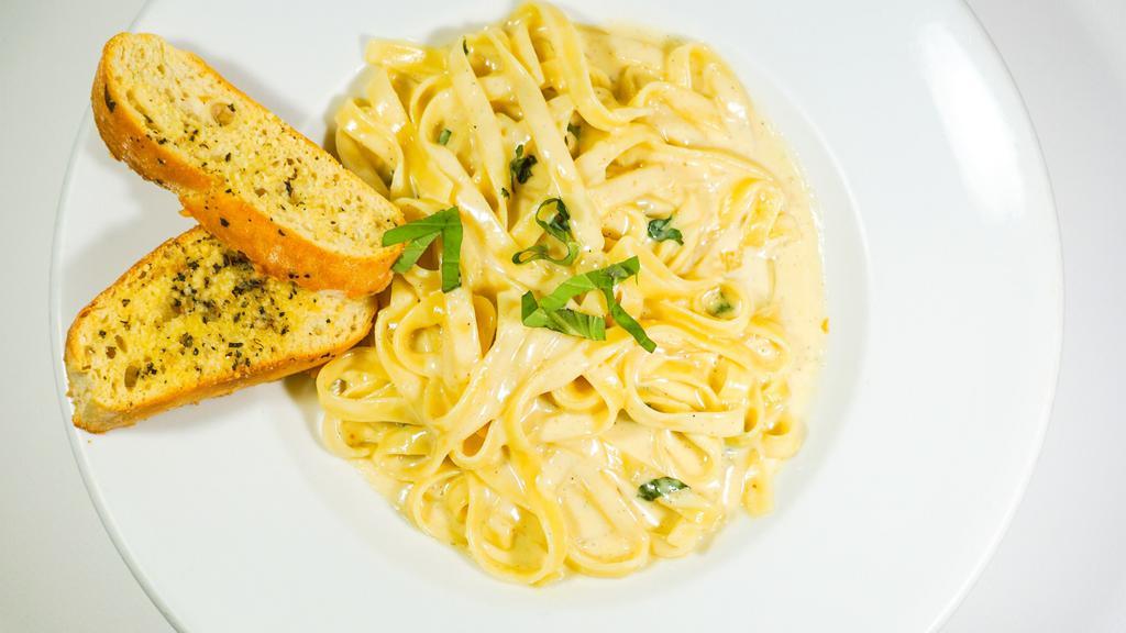 Fettuccine Pasta · In creamy alfredo sauce.