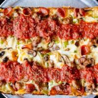 Large Omnivore · Natural casing pepperoni, sausage, green peppers, onions, mushrooms, and Detroit sauce.
