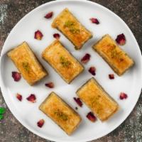 Flawless Baklava · Phyllo dough and almonds or pistachio depending on availability.