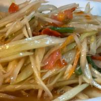 Lao Papaya Salad · Salad with a papaya in lime juice and special fermented fish sauce. It can be a bit more pun...