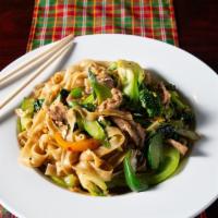 Kee Mow (Drunken Noodles) · Flat rice noodle stir-fried with egg Thai basil bell peppers, broccoli, Chinese broccoli, bo...