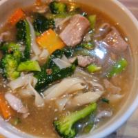 Lad Na · Wide rice noodles stir-fried, Bok choy, Chinese broccoli, broccoli, served under a gravy sau...