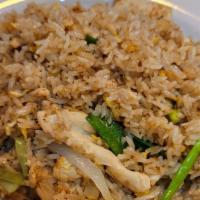 Fried Rice · Our classic fried rice stir-fried with scrambled egg, onions, scallions.

Picture shown chic...