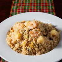 Pineapple Fried Rice · Our signature delicious fried rice with pineapple, cashews, raisins, scrambled egg, onions, ...