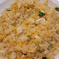 Crab Fried Rice · Our famous Thai fried rice is made with real crab meat, scrambled eggs, onions, and scallions.