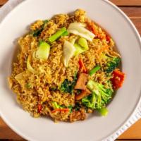 Yellow Curry Fried Rice · Our fried rice is stir fried with yellow curry powder, scrambled egg, onions, and scallions.