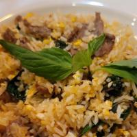 Basil Fried Rice · Our fried rice is stir-fried with fresh Thai basil for the good aroma, scrambled 29. Onions,...
