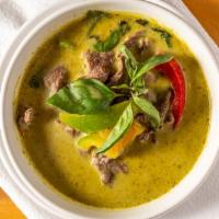 Green Curry · Thai green chili paste blend with coconut milk, zucchinis, bell peppers and fresh thai basil.